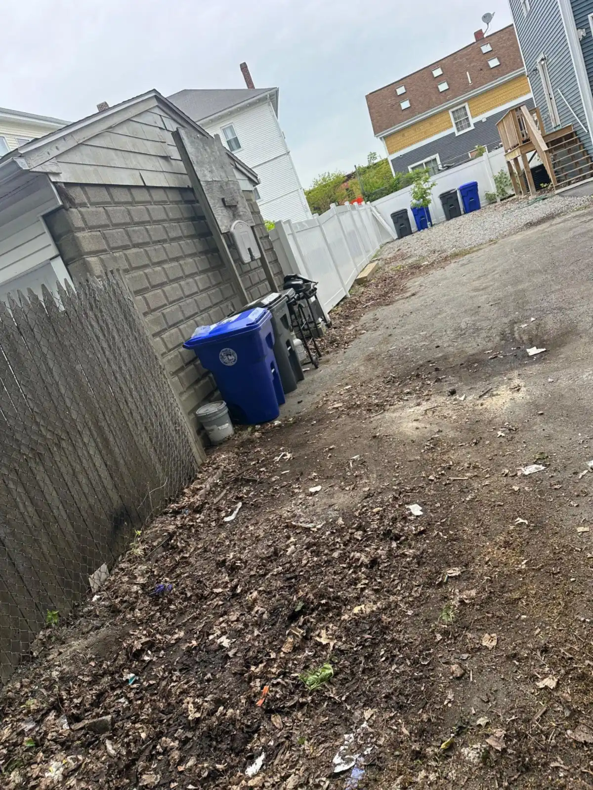 Side alley cleared after junk removal in Rhode Island