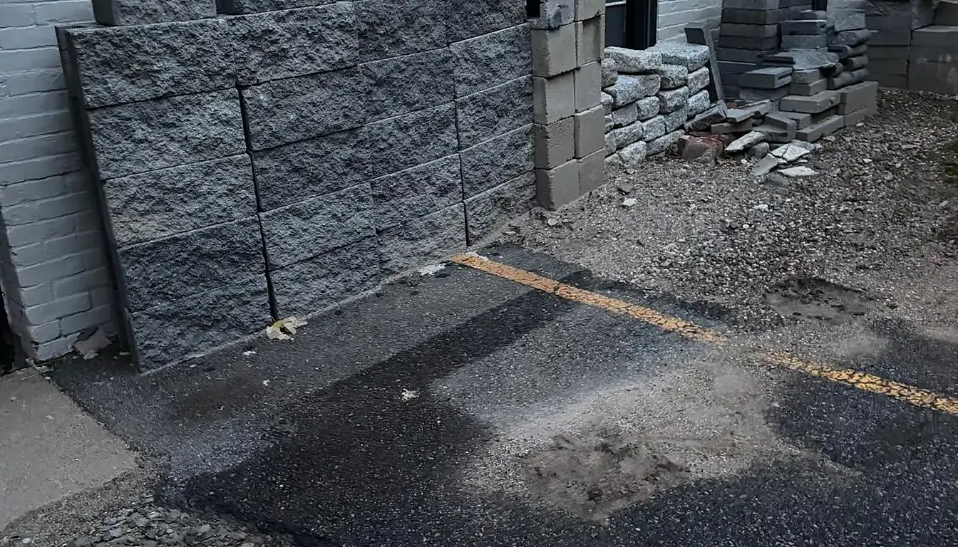 Spot beside the building clear after mattress and dresser removal