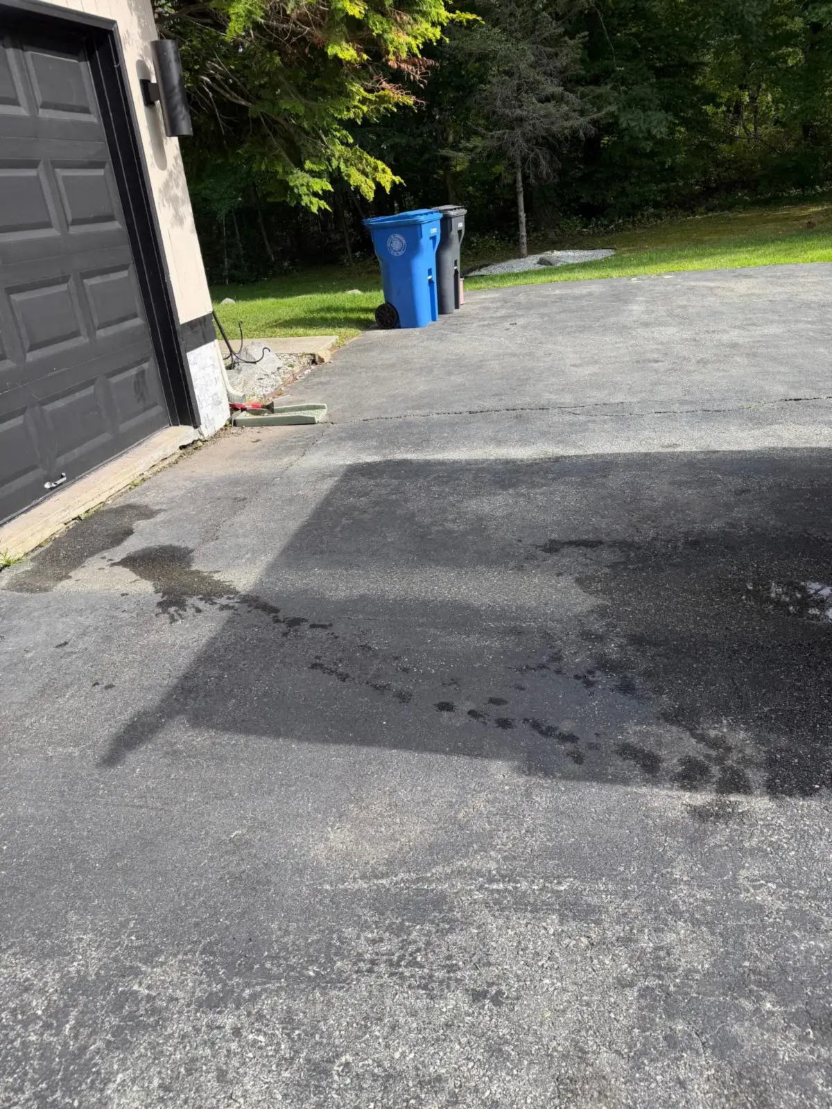 Garage driveway cleared after junk removal