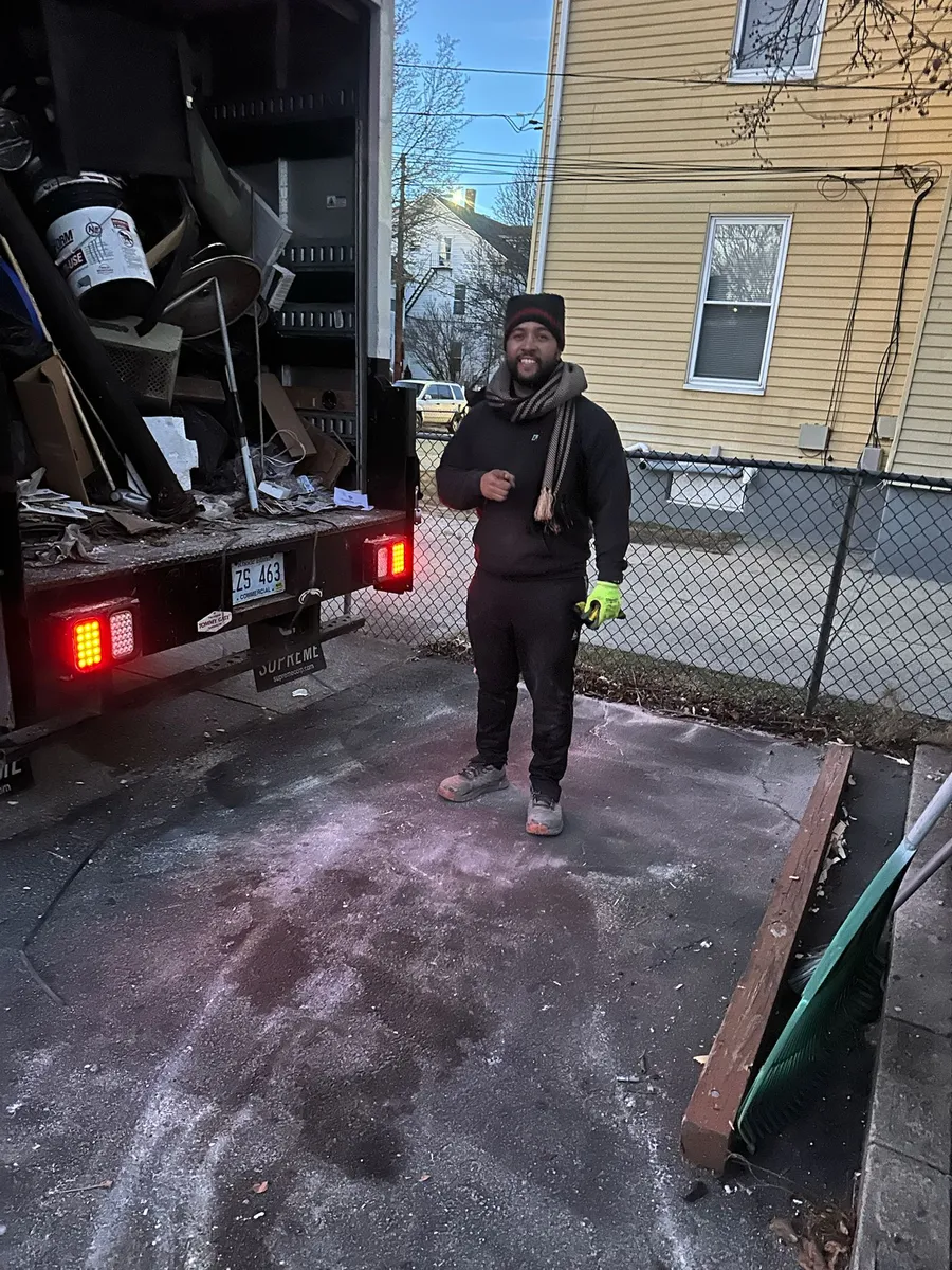 Phoenix Junk Removal crew loading furniture in Providence Rhode Island