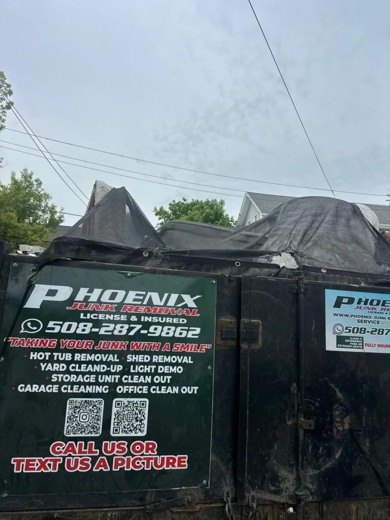 furniture movers Rhode Island carrying a sofa up stairs in Providence